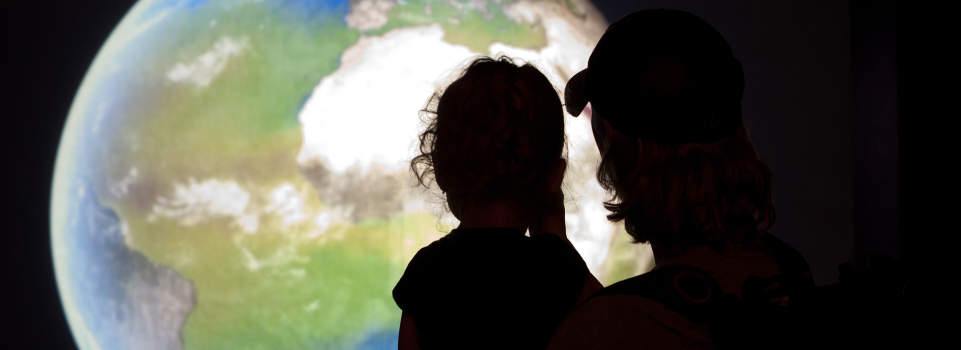Parent and Child observe NASA display exhibit at the Arizona-Sonora Desert Museum